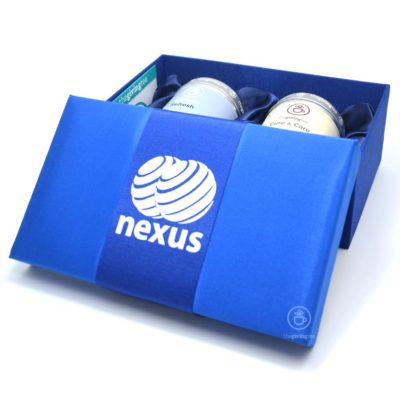 Nexus company. 2 tea tins in silk box